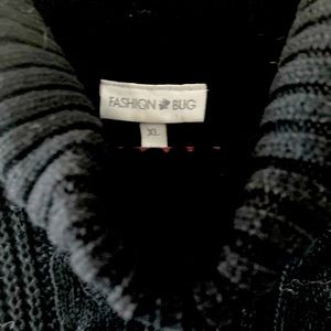 Black cable knit sweater.